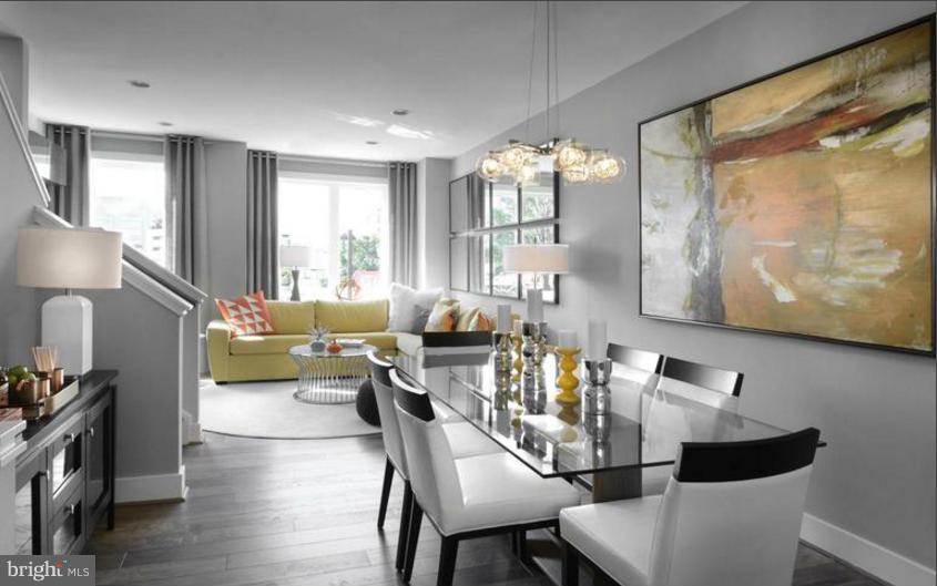 6680 Eames Way Bethesda, MD 20817 - Photo 3 of 19 a living room with furniture and a large window