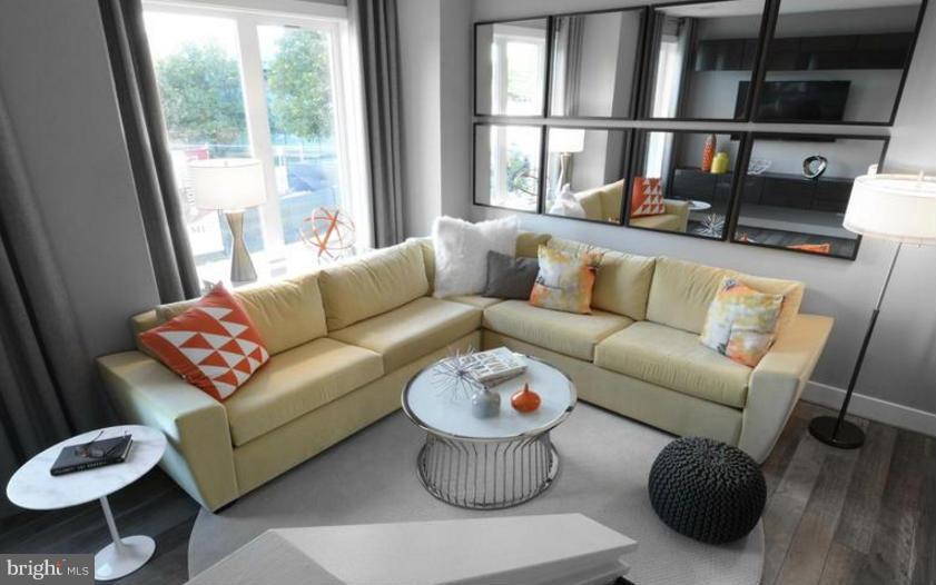 6680 Eames Way Bethesda, MD 20817 - Photo 5 of 19 a living room with furniture and a window