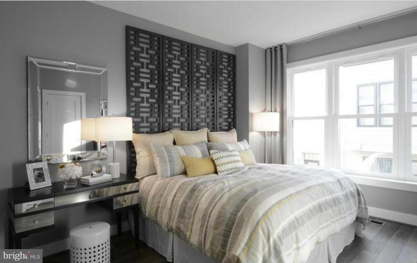 6680 Eames Way Bethesda, MD 20817 - Photo 8 of 19 a bedroom with a bed and a window