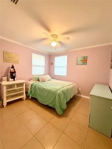 a bedroom with a bed and a cabinets