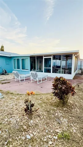 a front view of a house with patio