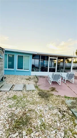 swimming pool view with outdoor seating