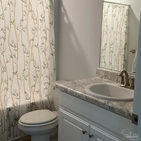 a view of a backyard of the house