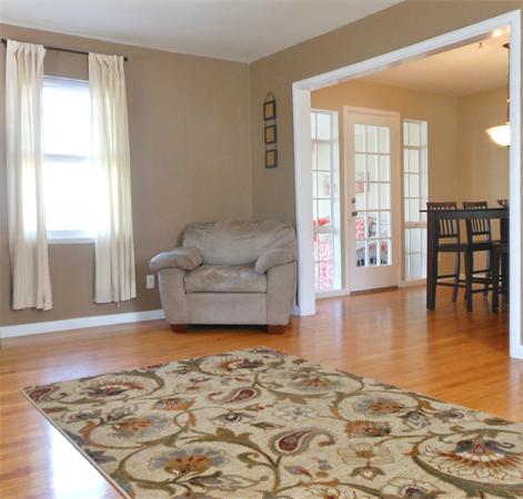 24 Benz Street Springfield, MA 01118 - Photo 8 of 21 a living room with furniture window and wooden floor