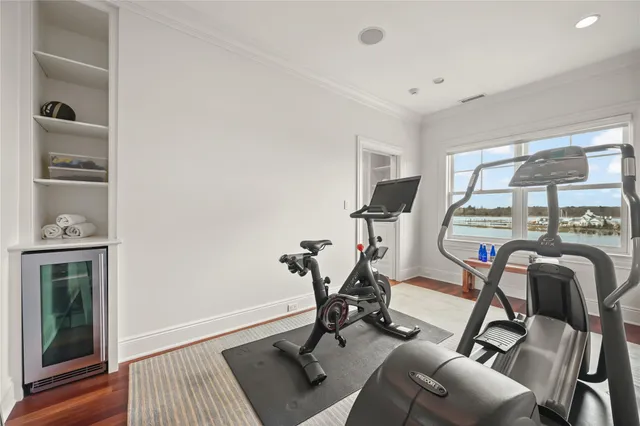 a spacious bathroom with a granite countertop sink a large mirror and a bathtub next to a window