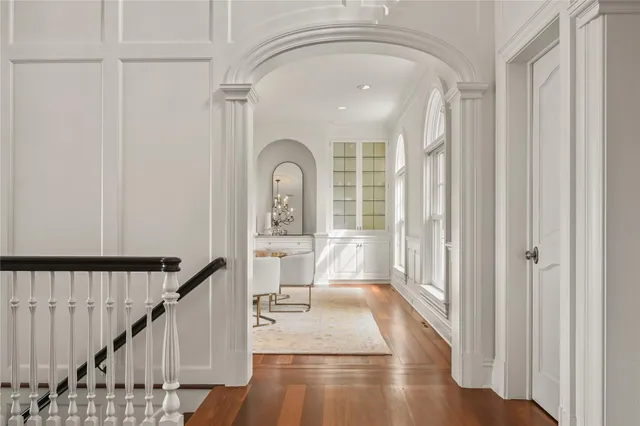 a view of entryway with wooden floor