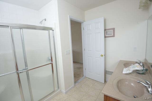 4140 Walter Road Bethlehem, PA 18020 - Photo 12 of 21 a bathroom with a sink and a mirror