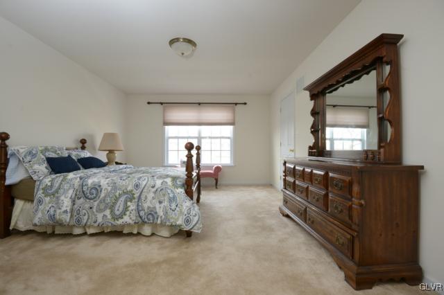 4140 Walter Road Bethlehem, PA 18020 - Photo 14 of 21 a spacious bedroom with two beds and a dresser
