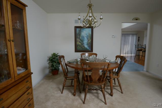 4140 Walter Road Bethlehem, PA 18020 - Photo 7 of 21 a view of a dining room with furniture and chandelier
