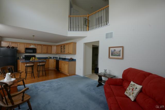 4140 Walter Road Bethlehem, PA 18020 - Photo 8 of 21 a living room with furniture kitchen view and a window