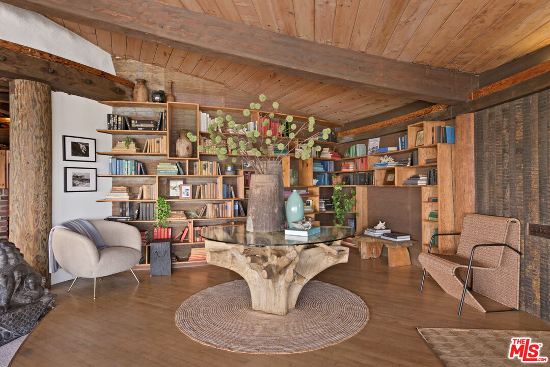 33604 Pacific Coast Highway Malibu, CA 90265 - Photo 11 of 46 a living room with lots of furniture and a chandelier
