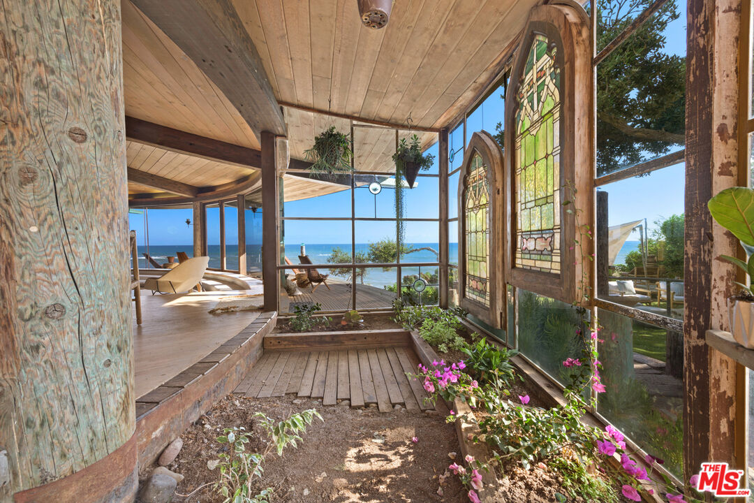 33604 Pacific Coast Highway Malibu, CA 90265 - Photo 15 of 46 a view of balcony with a potted plant