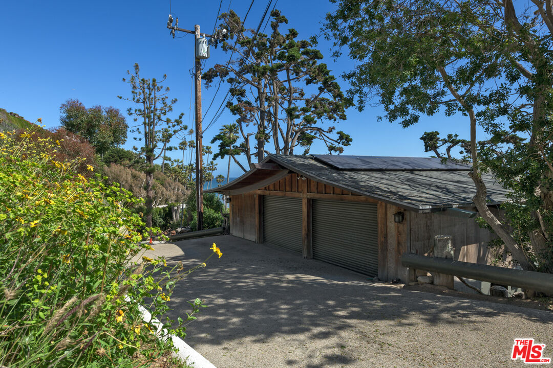 33604 Pacific Coast Highway Malibu, CA 90265 - Photo 27 of 46 a view of a house with a tree
