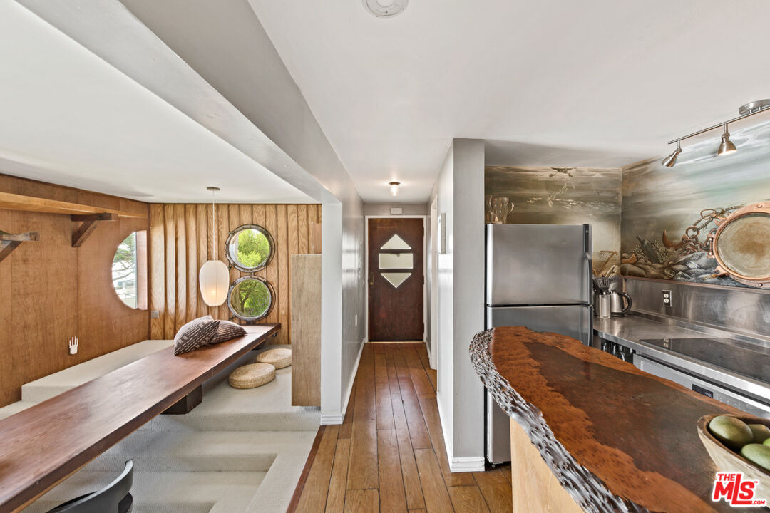 33604 Pacific Coast Highway Malibu, CA 90265 - Photo 30 of 46 a kitchen with sink refrigerator and window