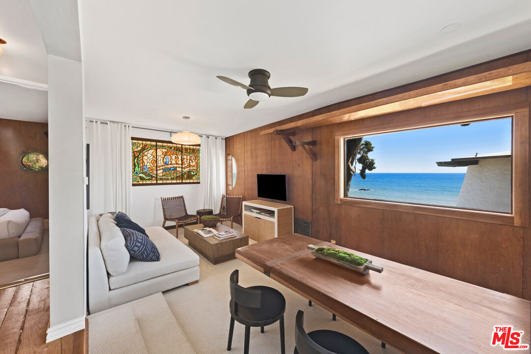 33604 Pacific Coast Highway Malibu, CA 90265 - Photo 31 of 46 a room with furniture and a flat screen tv