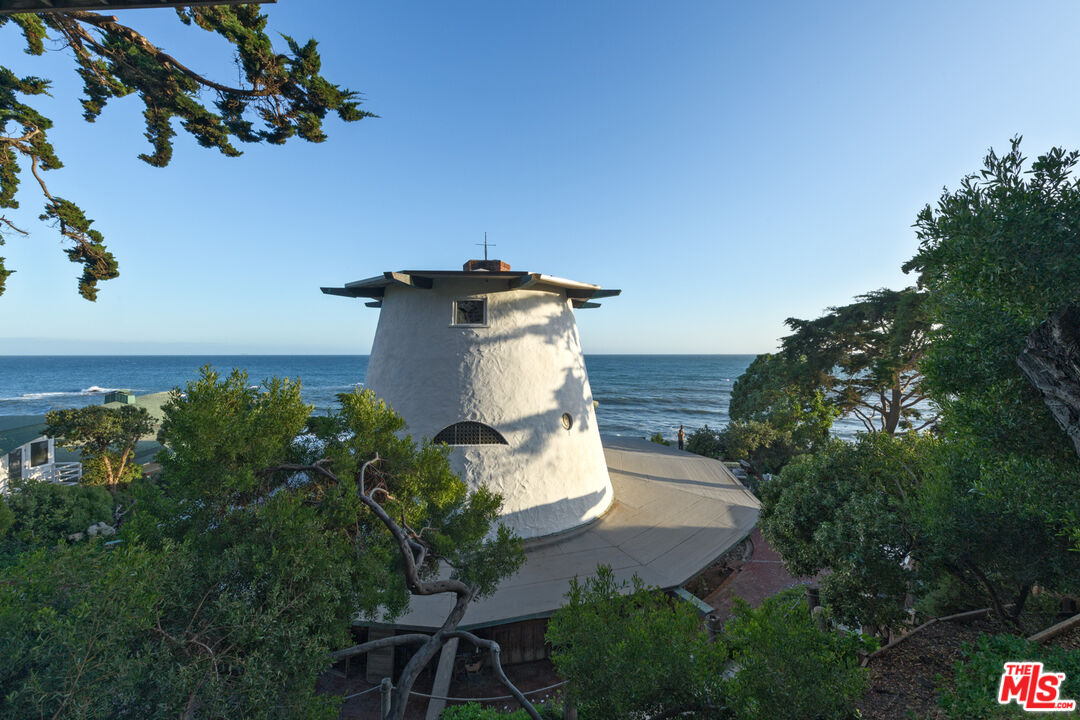 33604 Pacific Coast Highway Malibu, CA 90265 - Photo 37 of 46 an aerial view of a house with outdoor space and sitting space