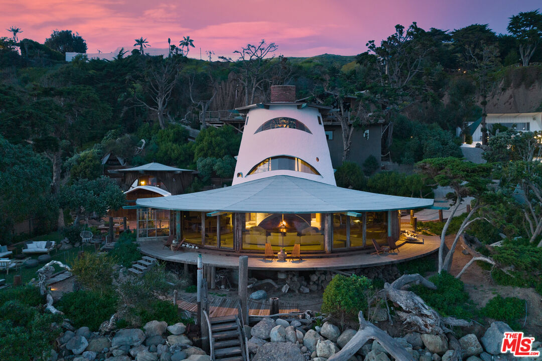 33604 Pacific Coast Highway Malibu, CA 90265 - Photo 39 of 46 a front view of a house with a yard