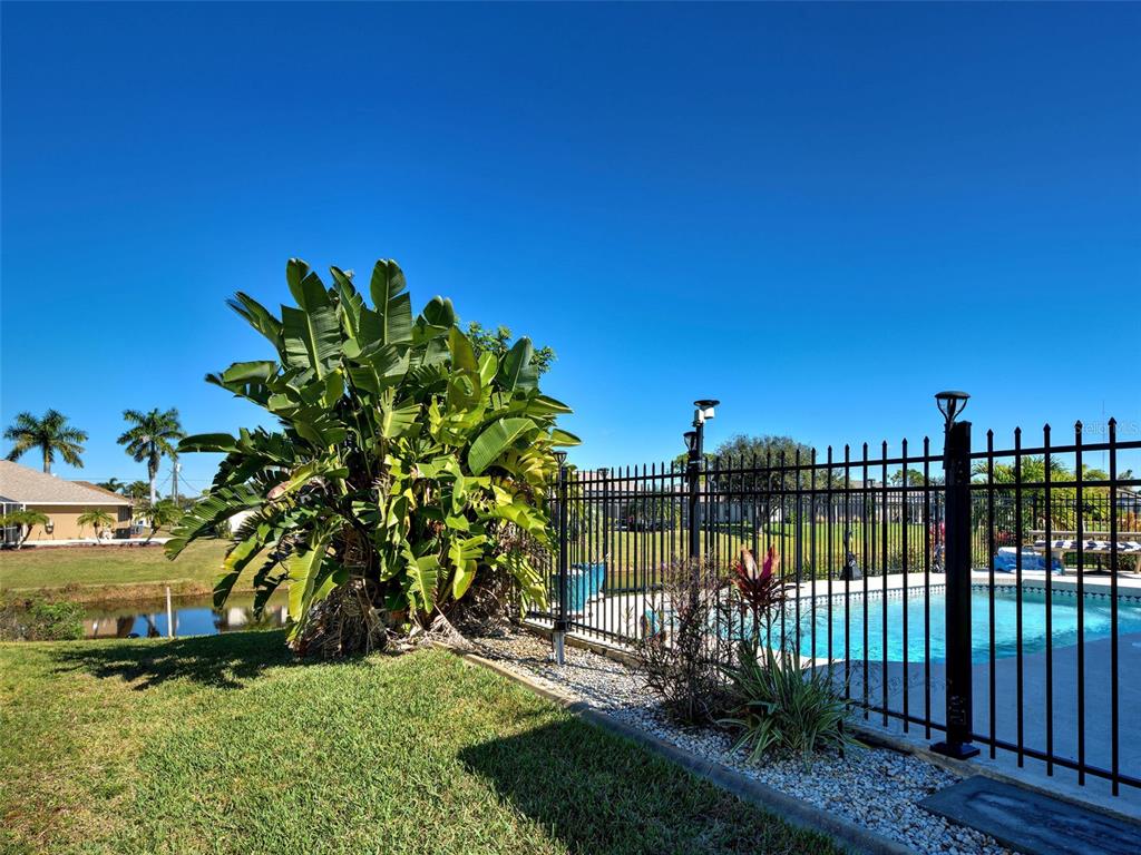 77 Medalist Road Rotonda West, FL 33947 - Photo 69 of 81 a view of a balcony with a tree