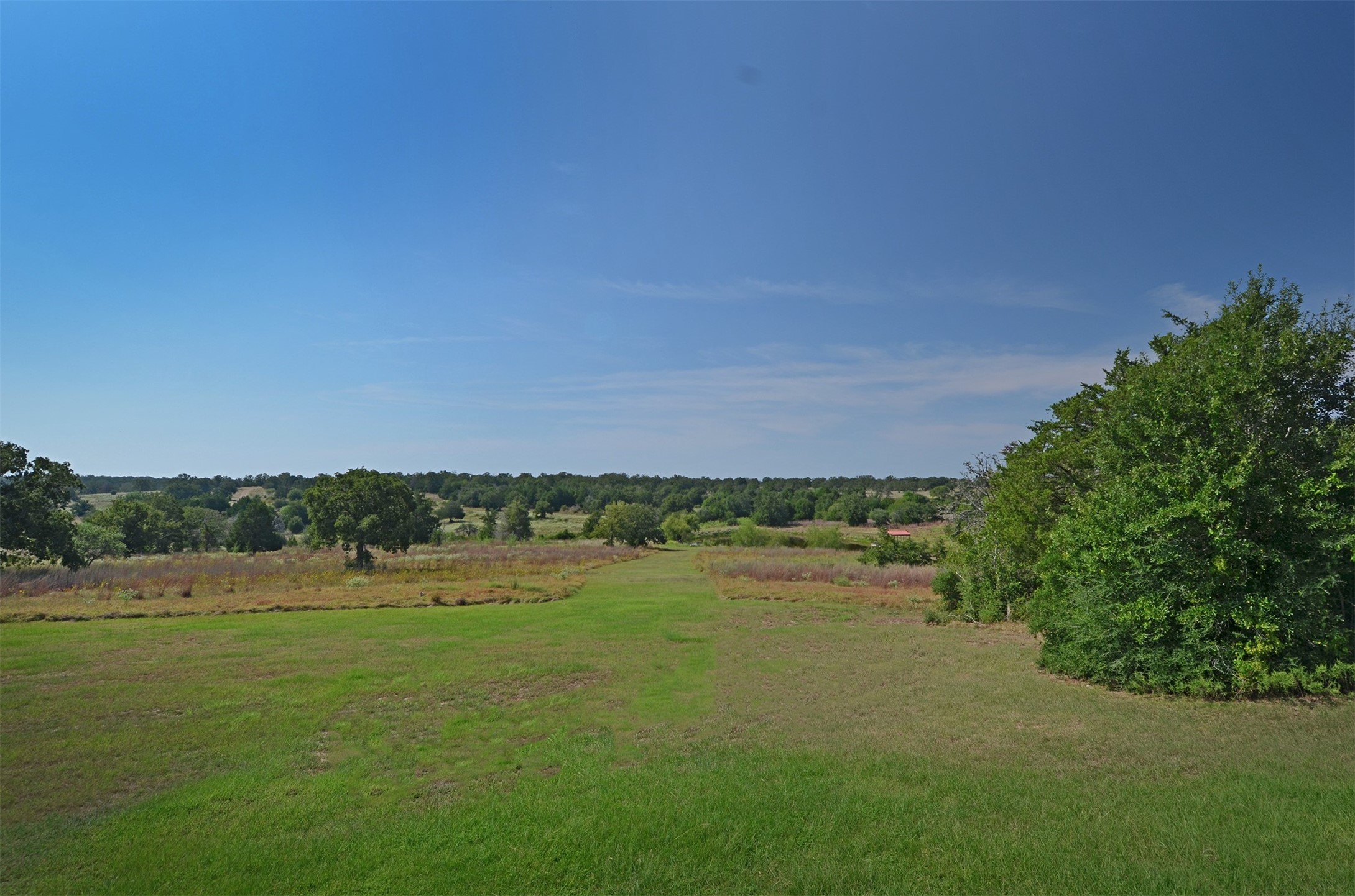 1880 Schoenberg Road Carmine, TX 78932 - Photo 34 of 36 a view of a lake with houses in the background