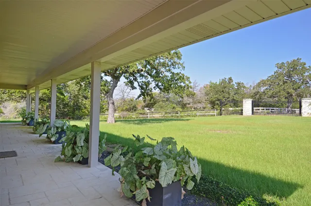 a view of a yard with an outdoor space