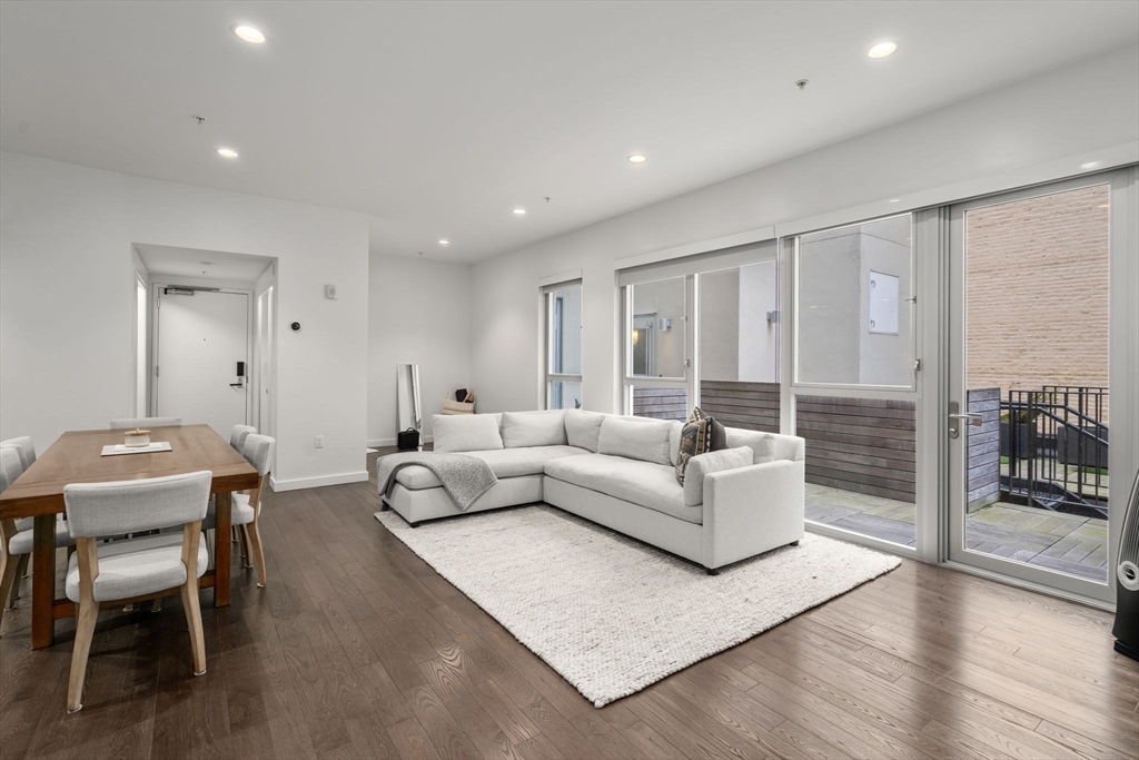 126 Salem Street, Unit 3 Boston, MA 02113 - Photo 10 of 22 a living room with furniture and wooden floor