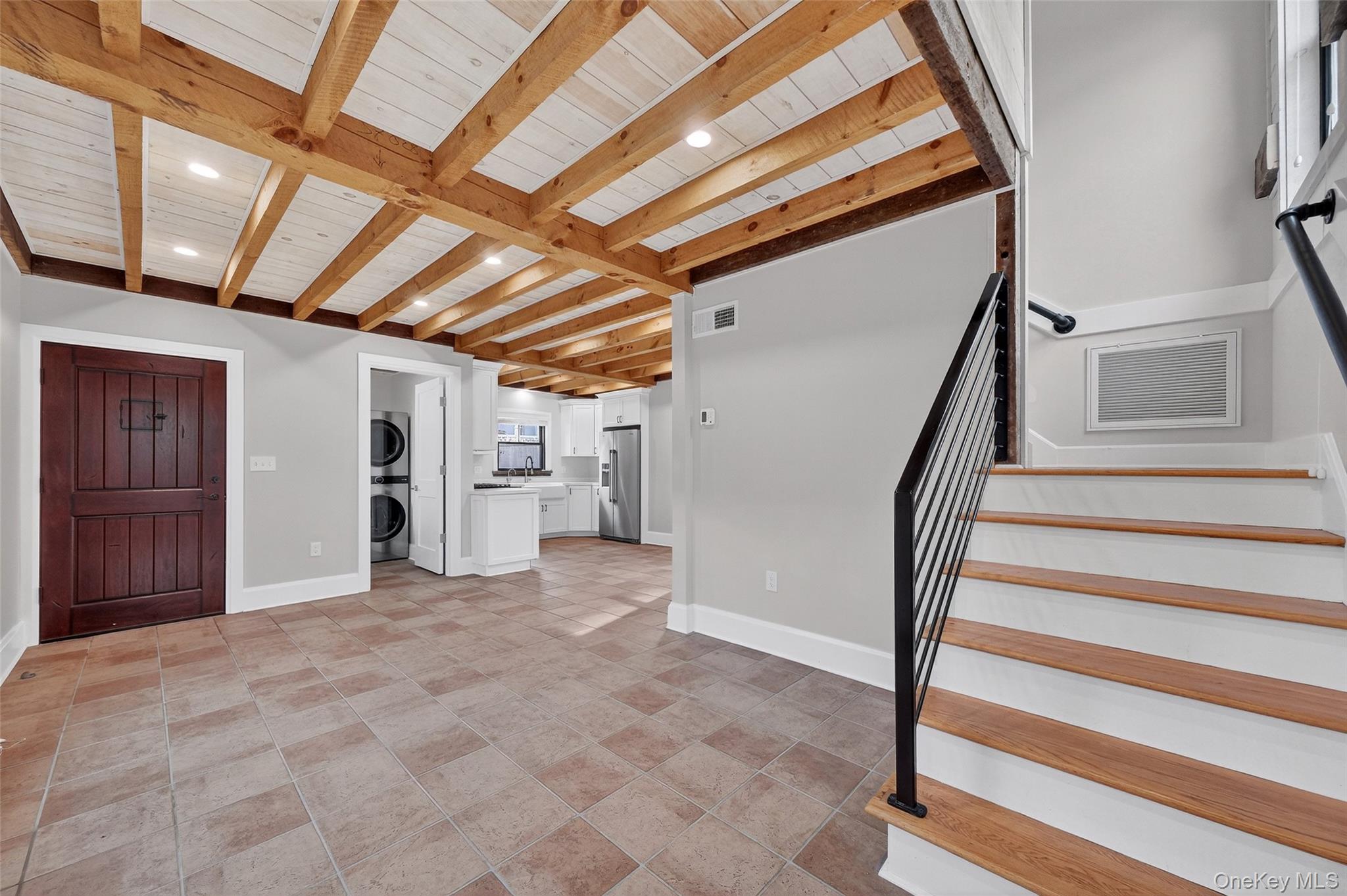 52 Ackerman Street, Unit 50 5 Beacon, NY 12508 - Photo 5 of 23 a view of an empty room with stairs