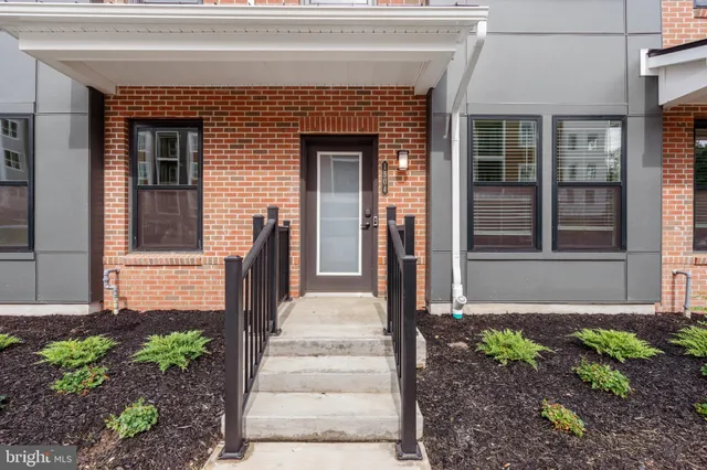 a front view of a house with a porch