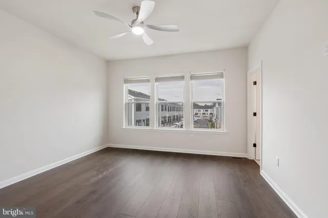 a bathroom with a shower sink and toilet