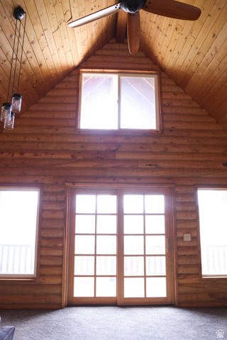 15253 Mill Road, Unit 62 Huntsville, UT 84317 - Photo 18 of 48 Vaulted wood-paneled ceiling with an exposed beam and ceiling fan