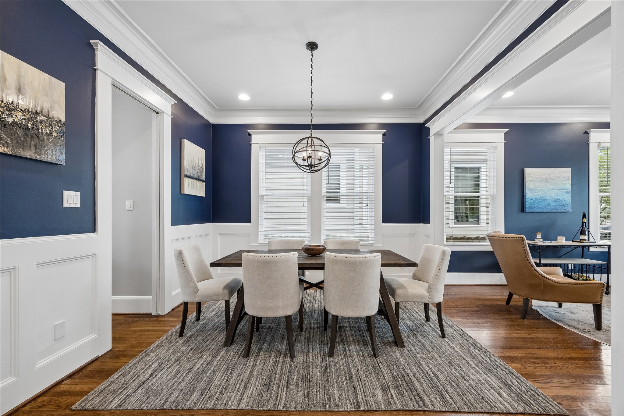 621 West 15th Street Houston, TX 77008 - Photo 15 of 37 The dining room with beautiful crown molding and wainscoting is easily accessible by both the formal living room and kitchen.