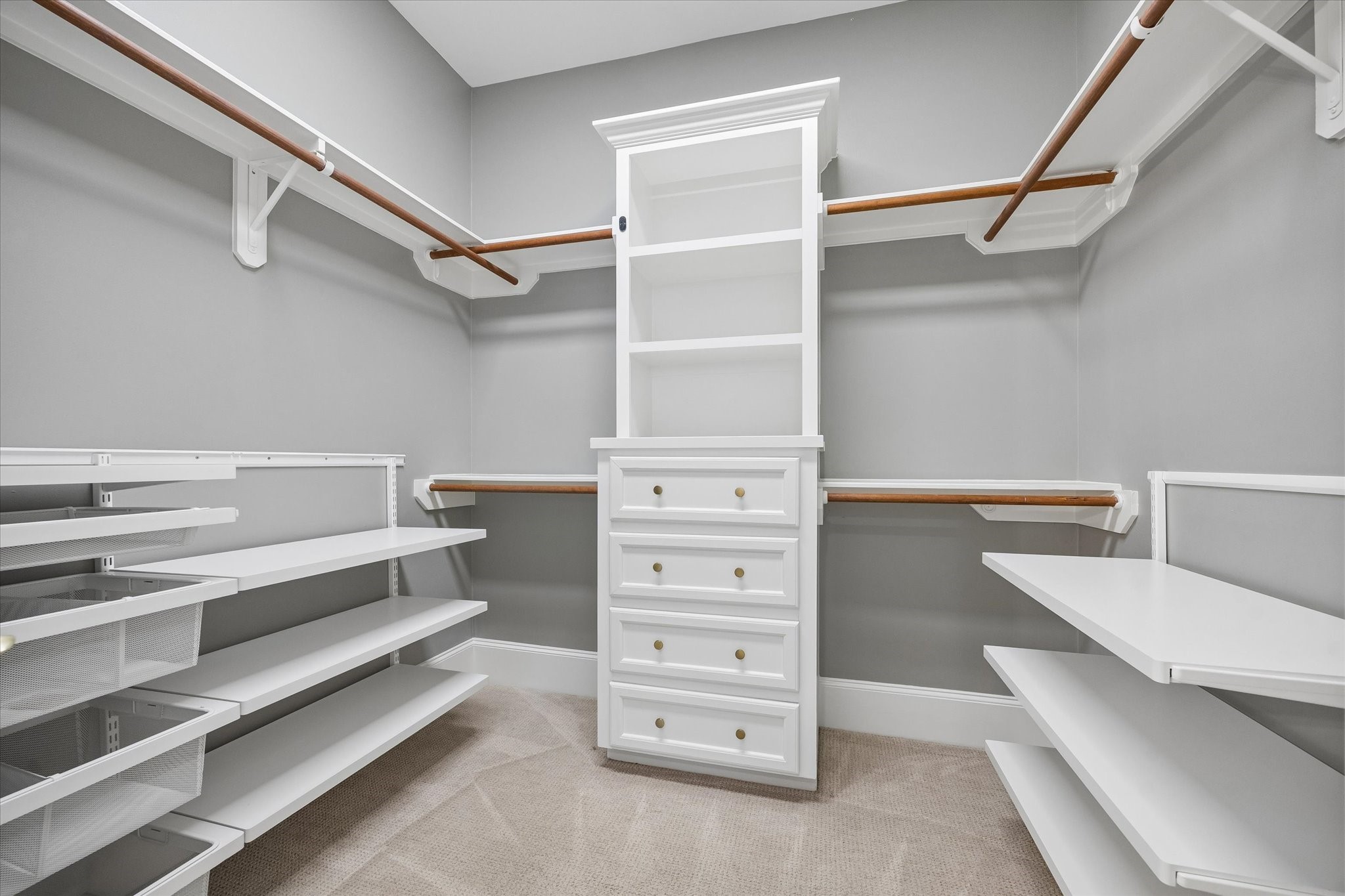 621 West 15th Street Houston, TX 77008 - Photo 24 of 37 Walk-in closet with built-ins and shelving designed to keep your belongings neatly organized and easily accessible.