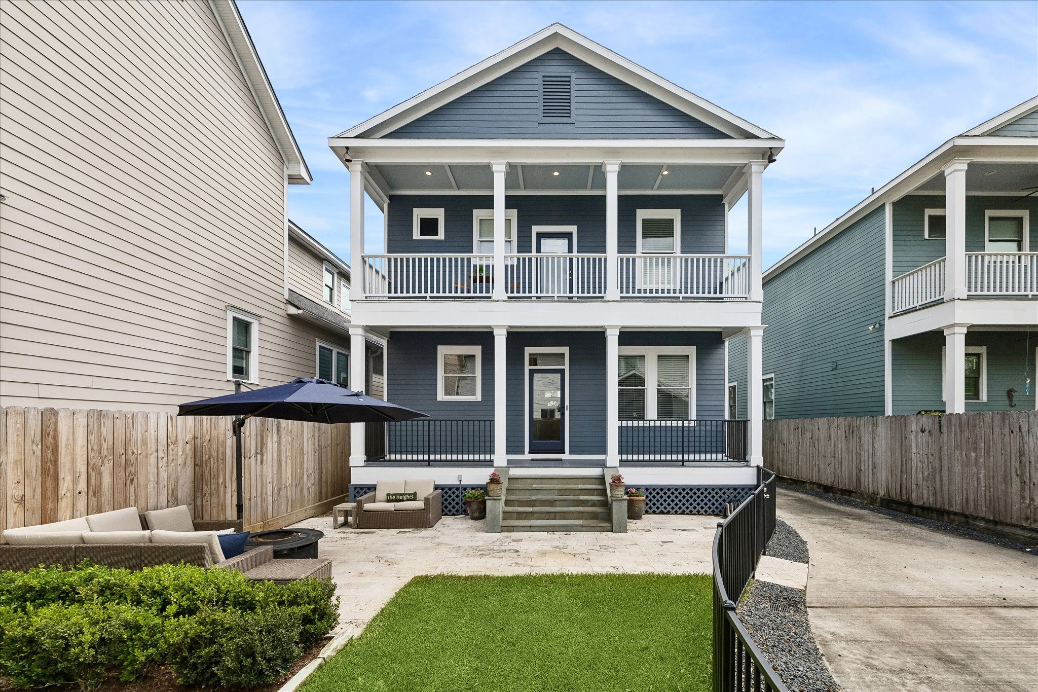621 West 15th Street Houston, TX 77008 - Photo 30 of 37 Enjoy multiple outdoor living spaces, including two covered porches that span the length of the home, plus a charming front porch and a back patio.