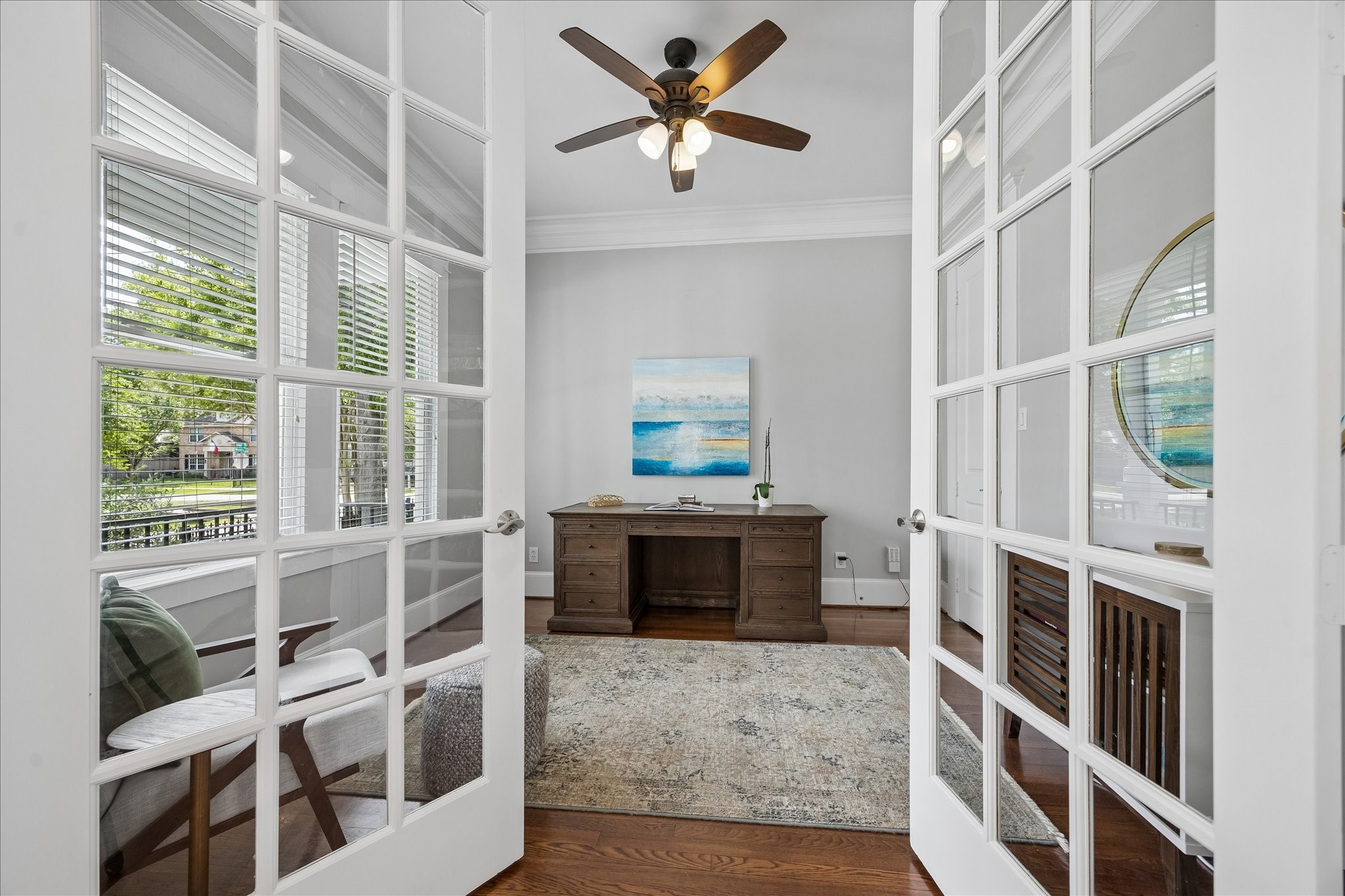 621 West 15th Street Houston, TX 77008 - Photo 5 of 37 Overlooking the front yard, the home office with French doors offers versatility as a potential 4th bedroom, complete with a walk-in closet and nearby full bathroom access.