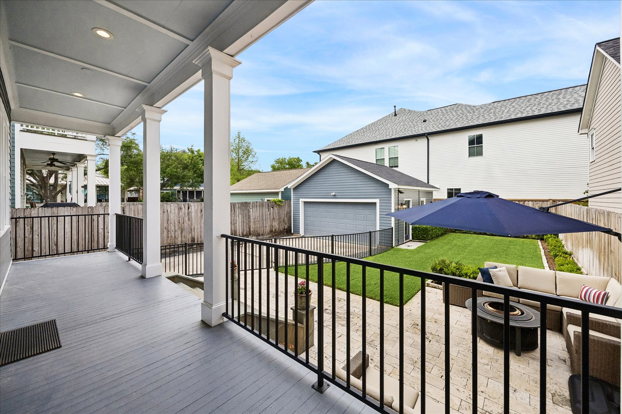 621 West 15th Street Houston, TX 77008 - Photo 7 of 37 The covered back porch, complete with recessed lighting, offers an ideal setting to relax and enjoy views of the backyard.
