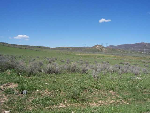 a view of an outdoor space and mountain view