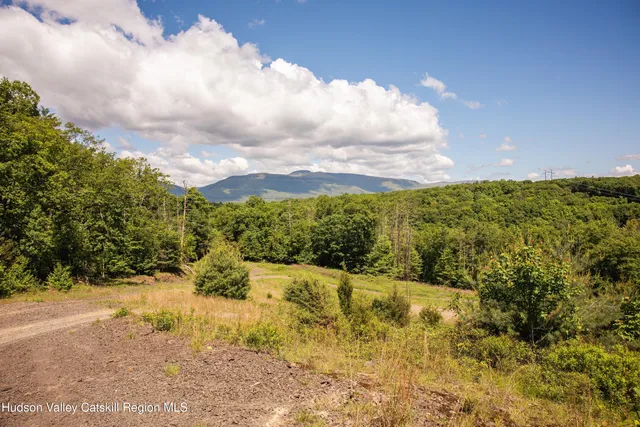 a view of a lake with a house