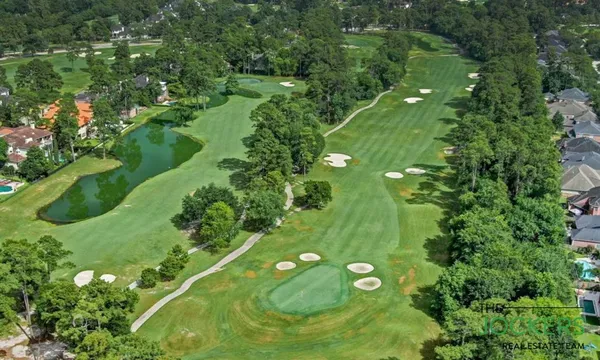 a view of a back yard with green space