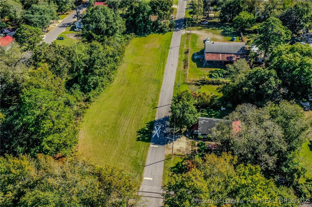 9th Street Lumberton, NC 28358 - Photo 14 of 17 an aerial view of a house with a yard basket ball court and outdoor seating
