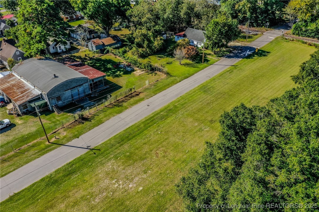 9th Street Lumberton, NC 28358 - Photo 15 of 17 an aerial view of residential houses with outdoor space and trees