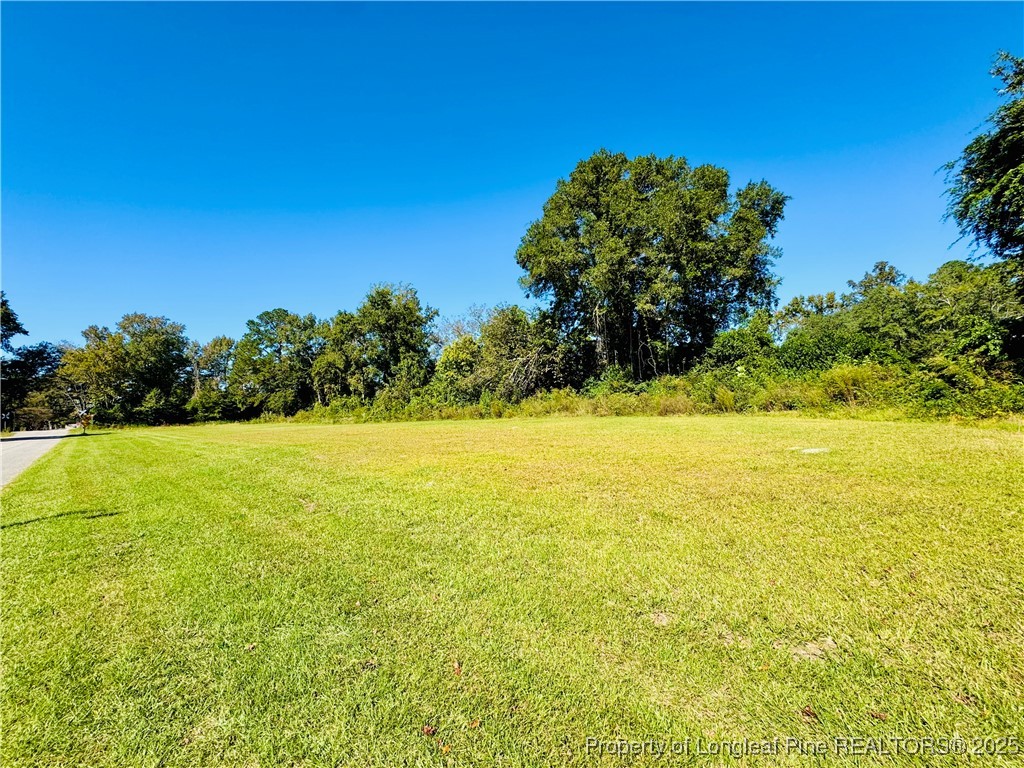 9th Street Lumberton, NC 28358 - Photo 4 of 17 a view of an outdoor space and swimming pool