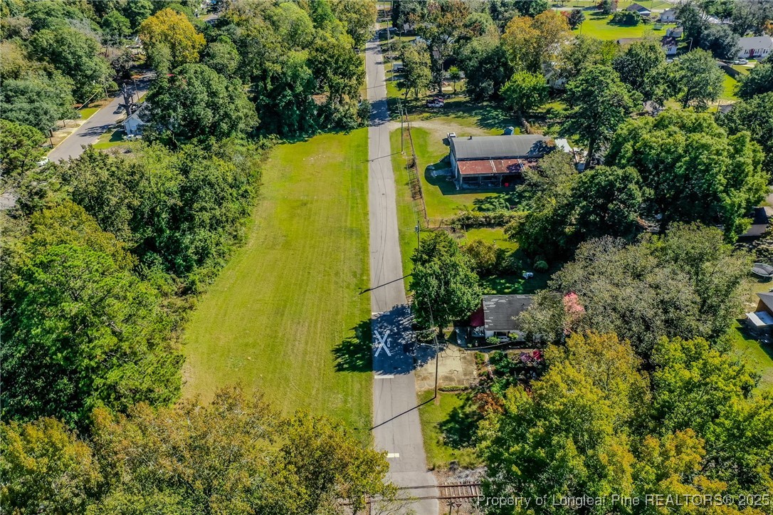 9th Street Lumberton, NC 28358 - Photo 5 of 17 an aerial view of residential house with swimming pool and large trees