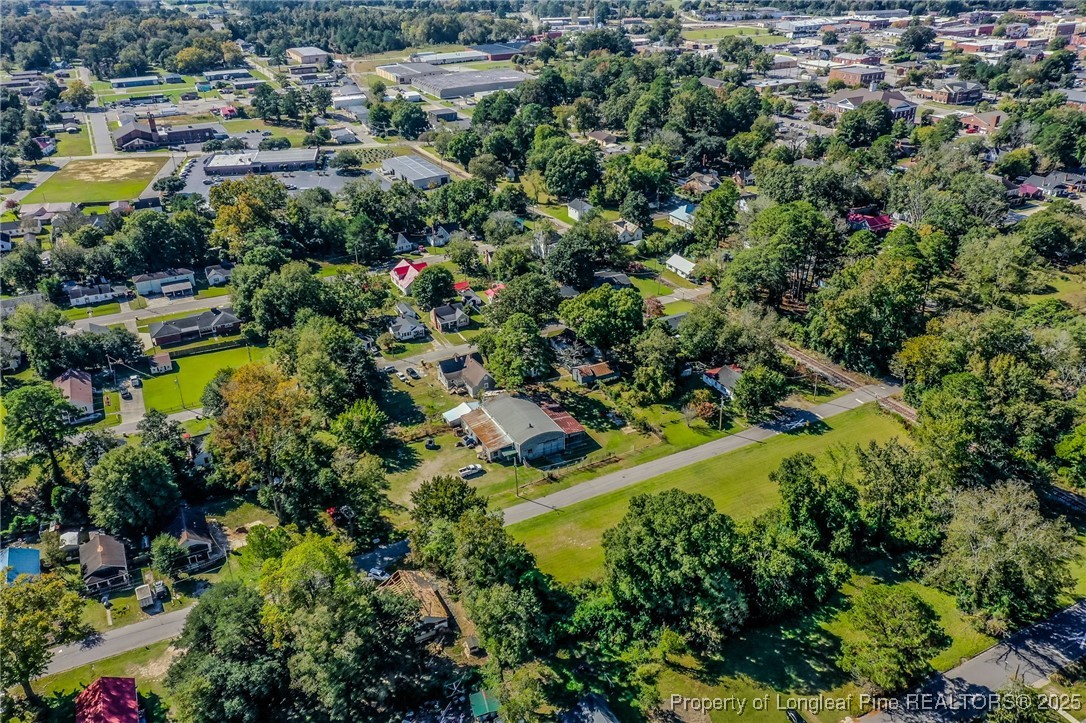 9th Street Lumberton, NC 28358 - Photo 8 of 17 an aerial view of residential houses with outdoor space and trees