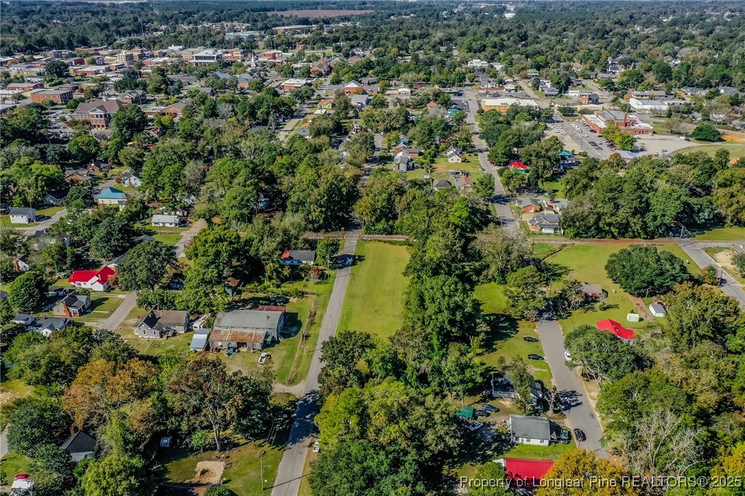 9th Street Lumberton, NC 28358 - Photo 9 of 17 an aerial view of residential houses with outdoor space and trees