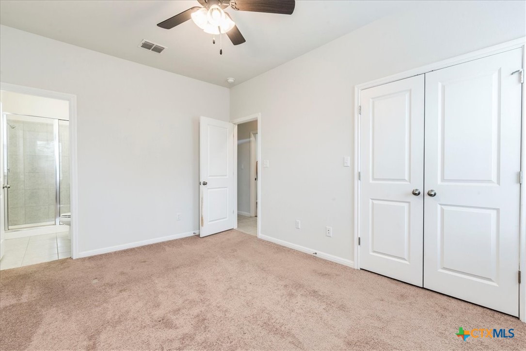 360 Spiny Lizard Lane San Marcos, TX 78666 - Photo 11 of 22 an empty room with fan