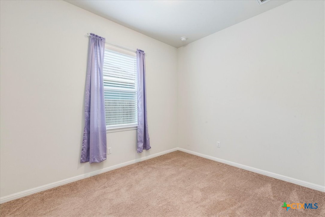 360 Spiny Lizard Lane San Marcos, TX 78666 - Photo 13 of 22 a view of a room with a window