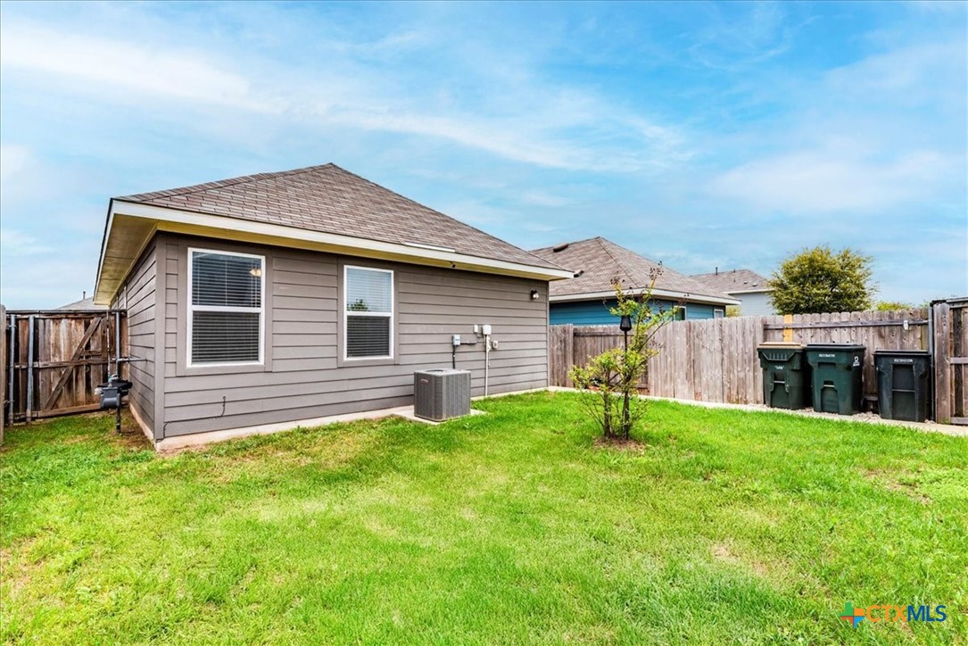 360 Spiny Lizard Lane San Marcos, TX 78666 - Photo 21 of 22 a front view of house with yard