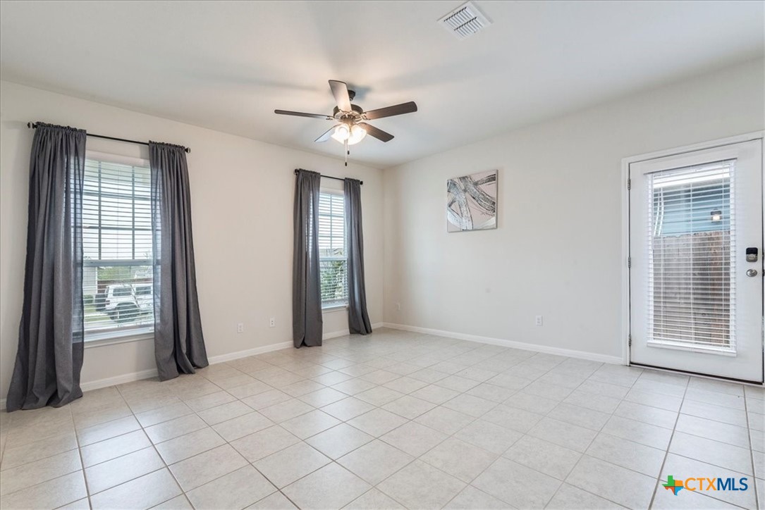 360 Spiny Lizard Lane San Marcos, TX 78666 - Photo 5 of 22 a view of an empty room with a window