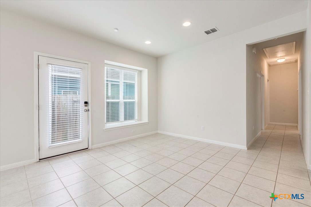 360 Spiny Lizard Lane San Marcos, TX 78666 - Photo 9 of 22 a view of an empty room with a window