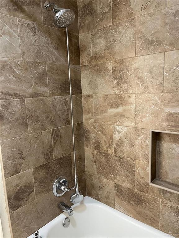 1216 Quail Avenue McAllen, TX 78504 - Photo 19 of 28 a bathroom with a shower