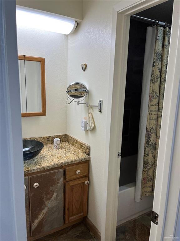 1216 Quail Avenue McAllen, TX 78504 - Photo 23 of 28 a utility room with a sink dryer and washer